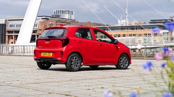 Red Kia Picanto parked rear