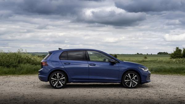 Blue 2024 Volkswagen Golf side parked