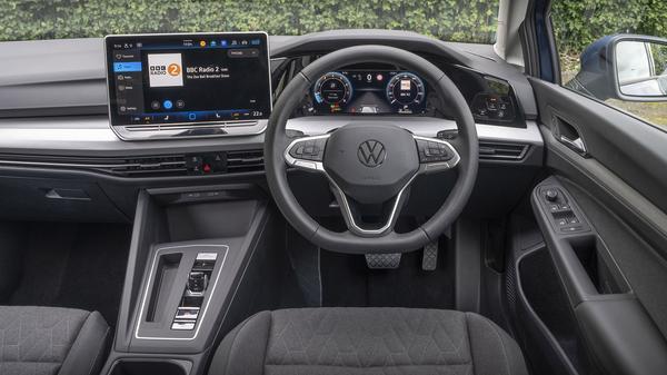 Blue 2024 Volkswagen Golf front interior